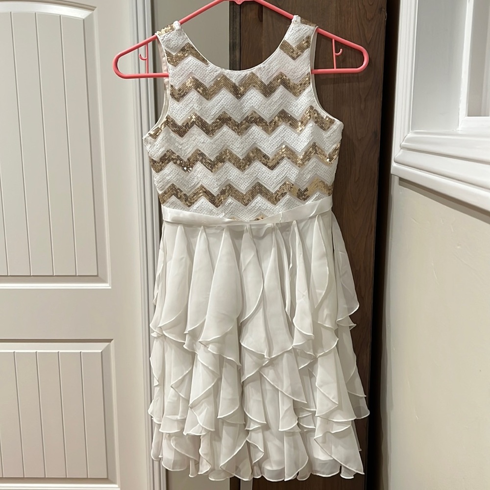 Emily West - Girls Size 10 - White dress with golden accent. Belt and zipper